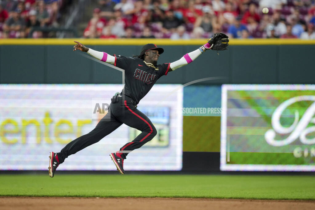 Marte delivers clutch hit as the Reds rally in 9th to beat the