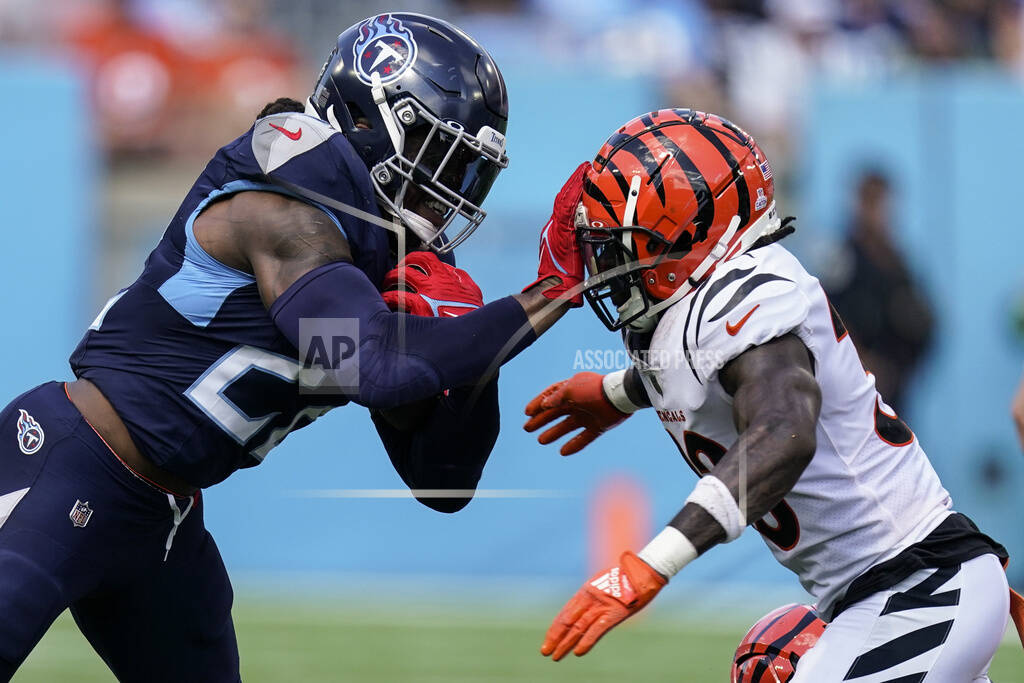Henry runs for TD, throws for score as Titans rout Burrow, Bengals 27-3 -  Record Herald